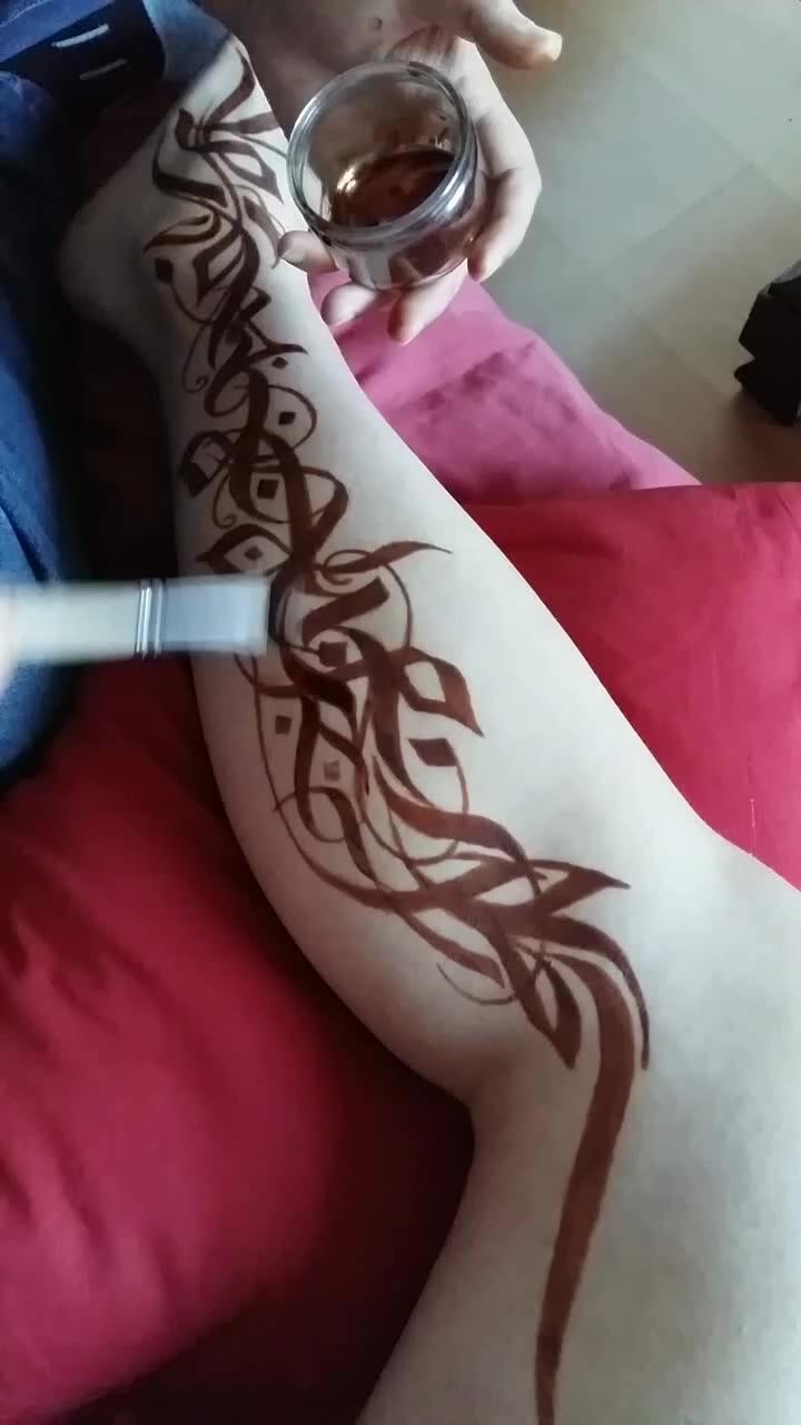 Henna tattoo calligraphy style; tribal henna designs