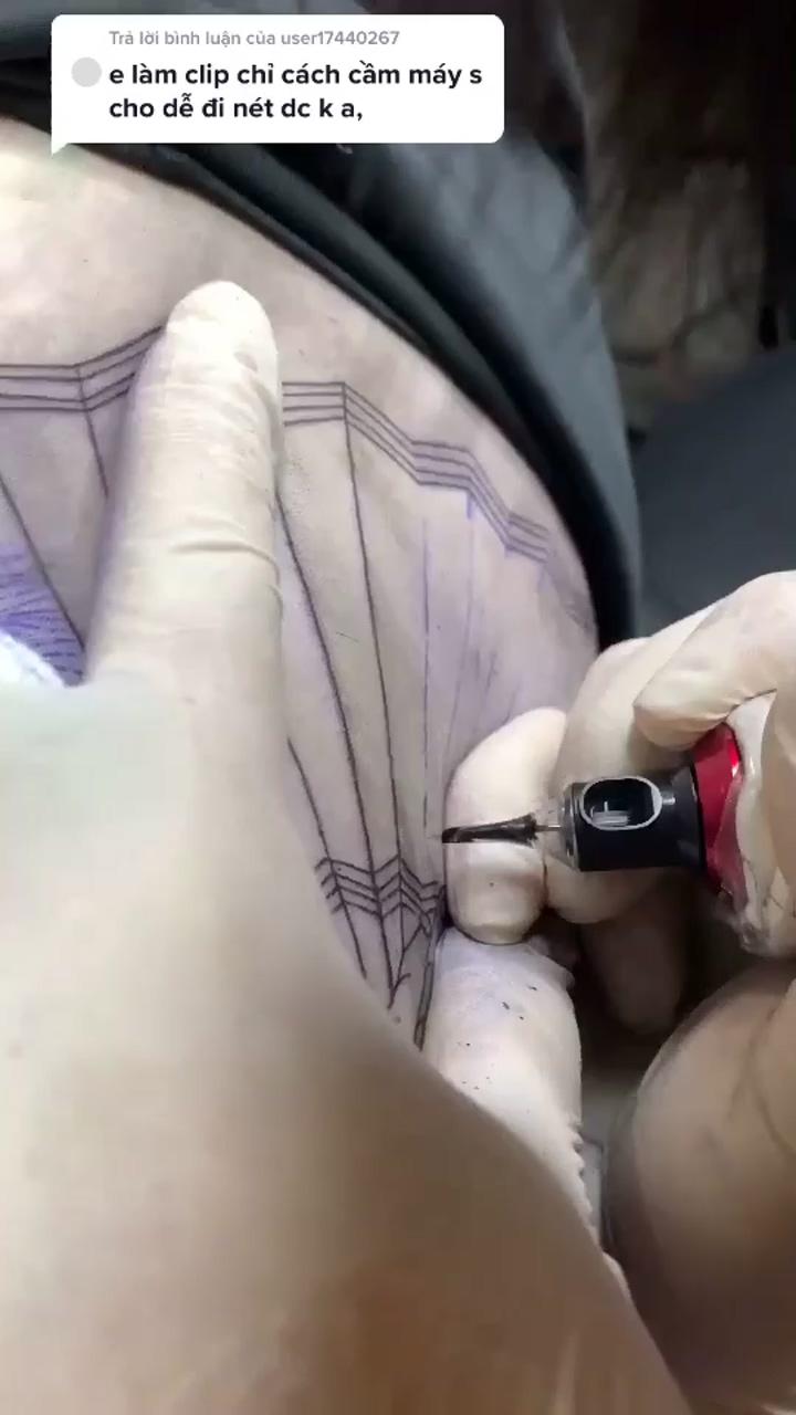 How to hold a tattoo machine; hand tattoos for guys