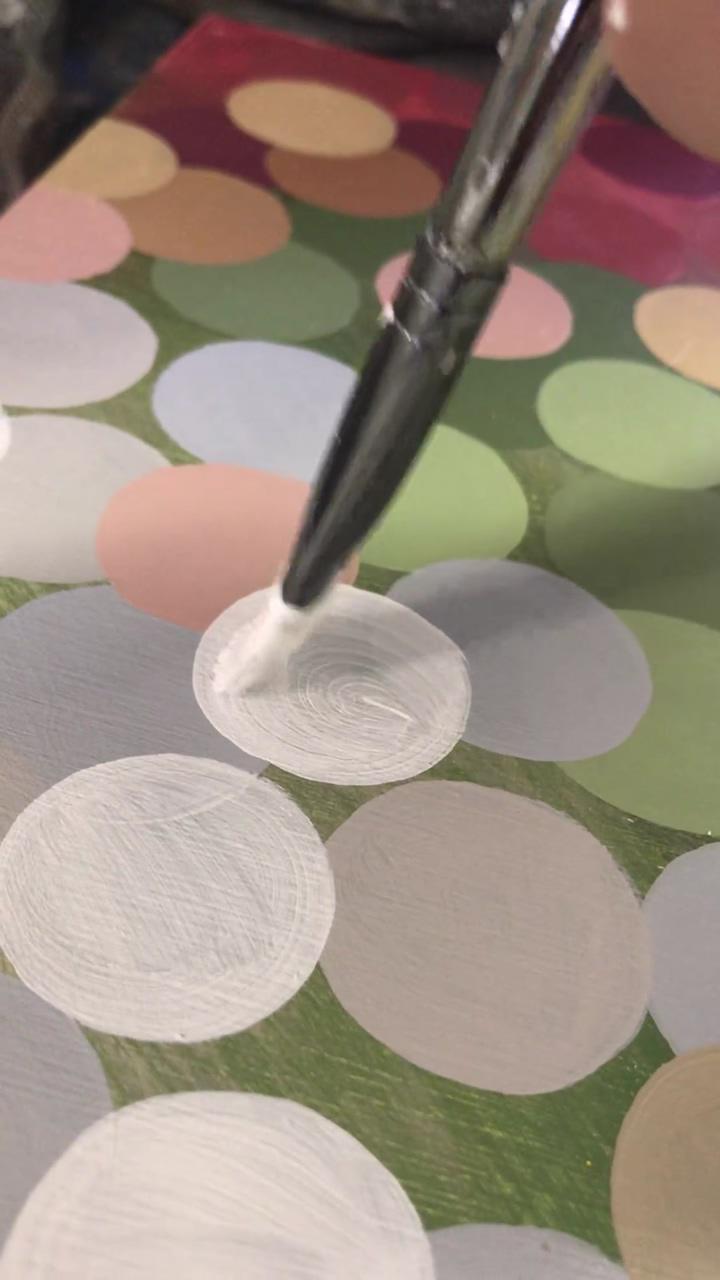 One minute painting small circles; array of watercolor paintings