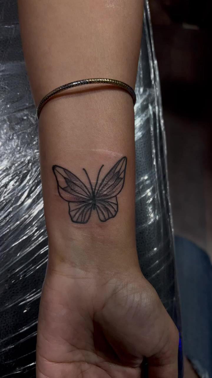 Butterfly tattoo; brother tattoos