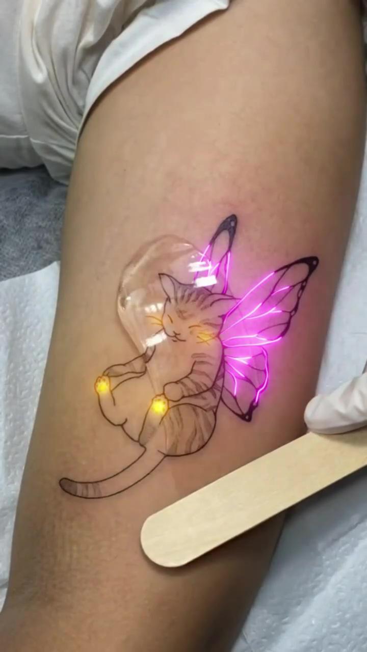 Cat tattoo. dm me to get your tattoo light up; tokyo ghoul tattoo