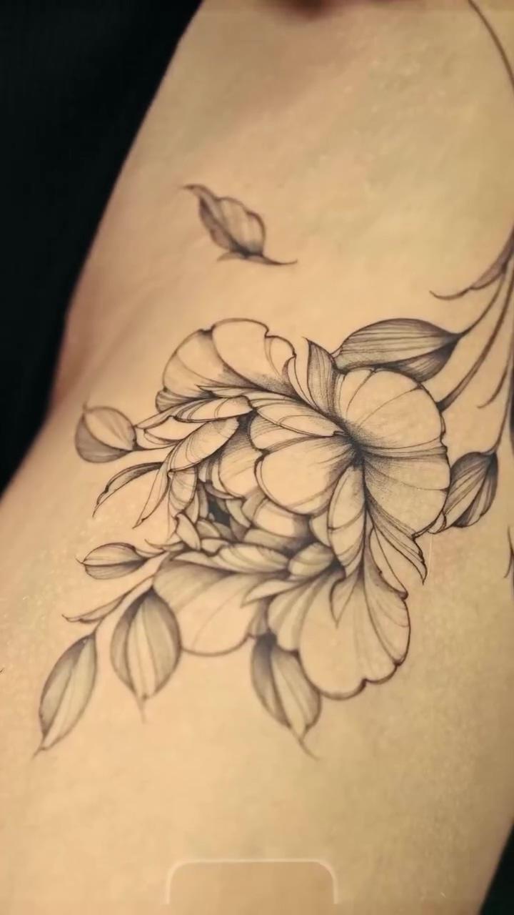 Floral tattoo; cerberus tattoo