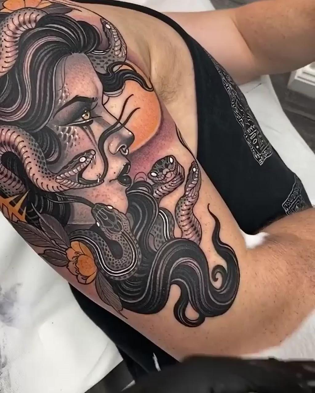 Medusa and snake tattoo; wolf tattoo done by c gabriele pellerone