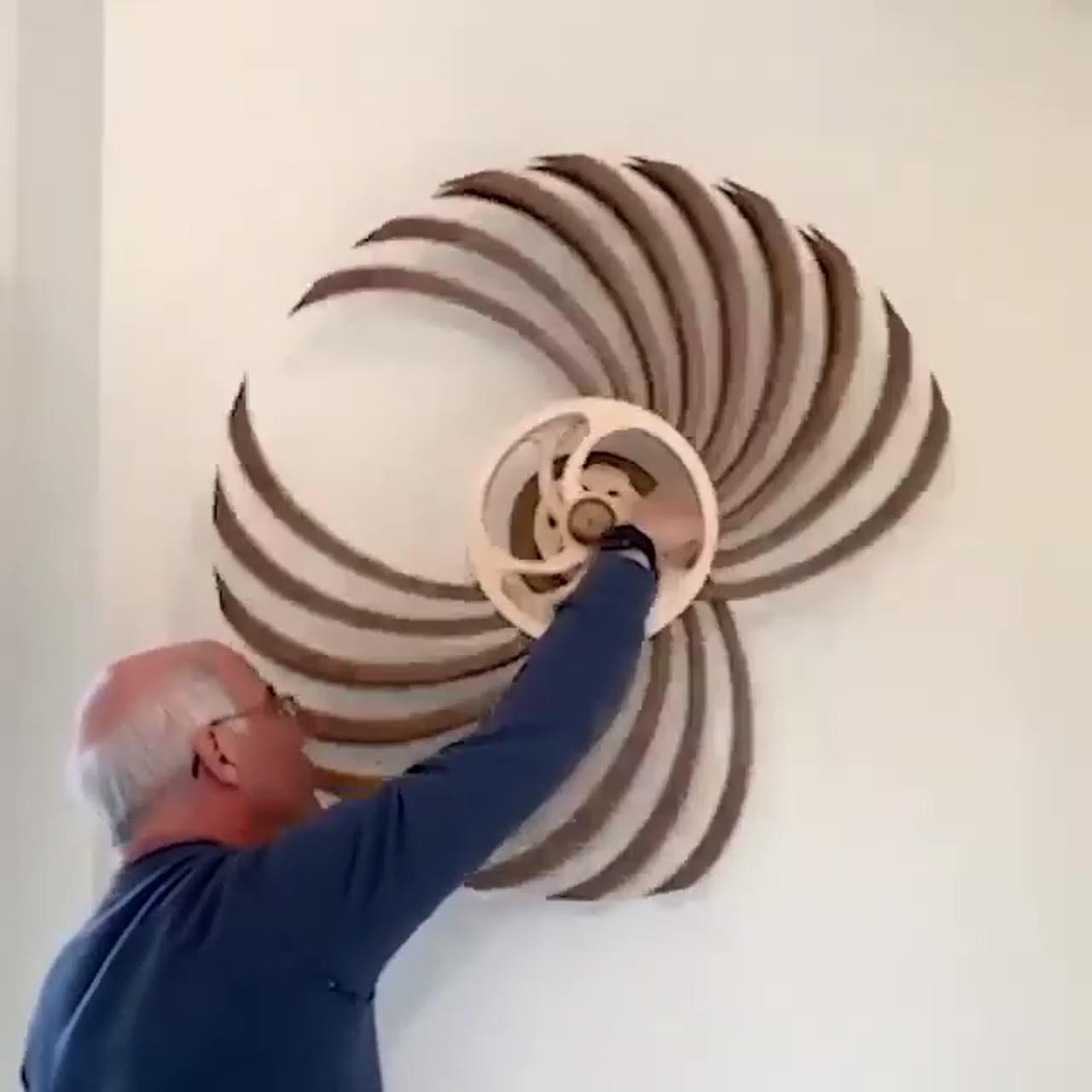100% handmade kinetic wooden sculpture; oh my god, i'm going to take a shower and watch it, it's so good