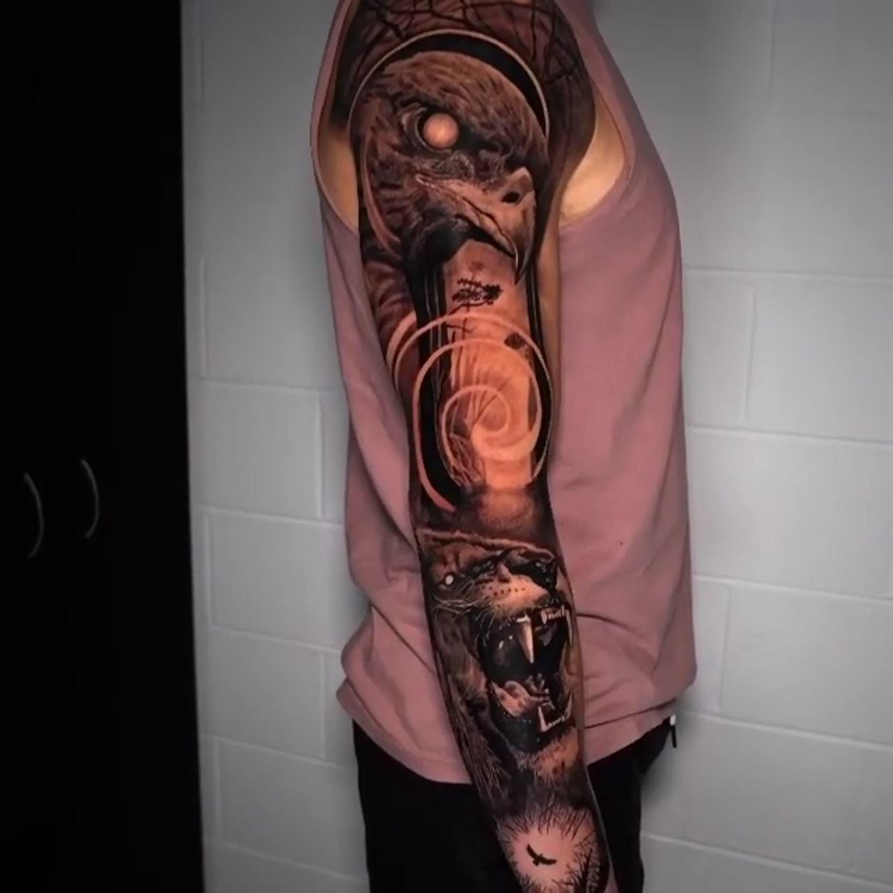 Black and grey tattoo on armsleeve; australian tattoo