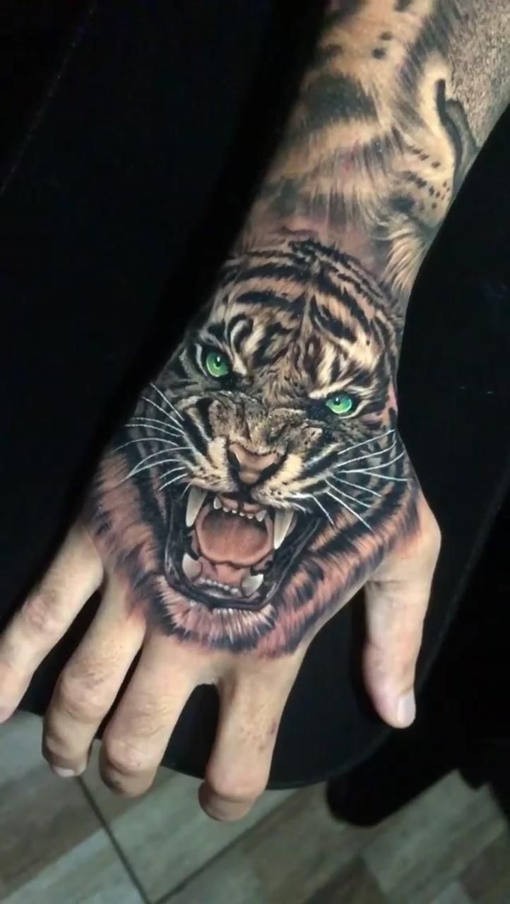 Follow me tattossideas_plantillas in instagram ;; tiger hand tattoo