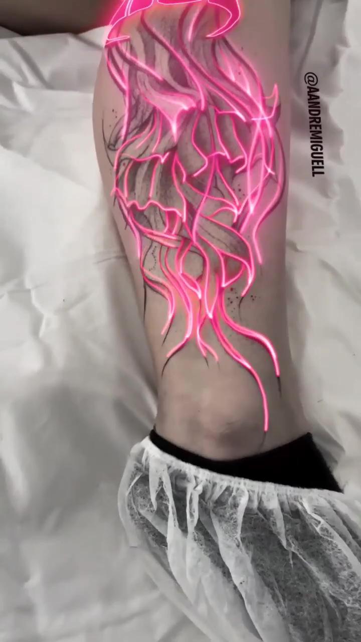 Neon tattoo living water; tattoo on arm, aesthetic