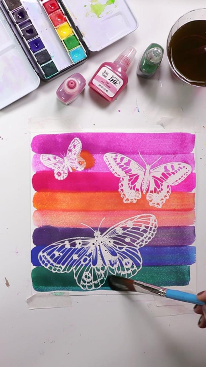 Watercolor resist butterflies; drill spin art with kids